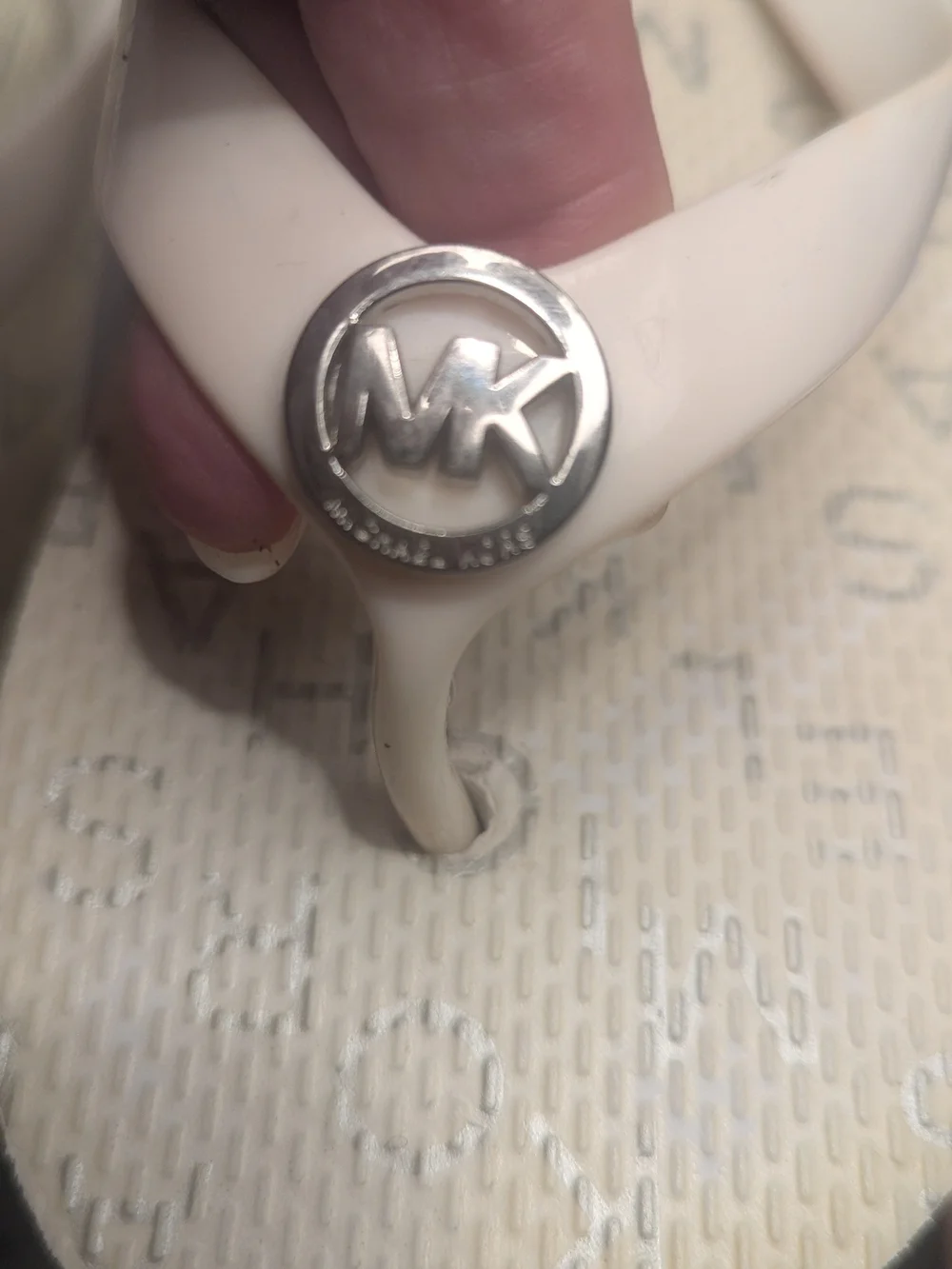 Michael Kors White Flip Flop with Silver MK Medallion